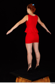 Charlie Red black high heels business dressed red dress standing…